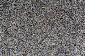 A black and grey gravel texture using for a background. 