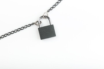 Fototapeta na wymiar padlock with chain on white background with copy space
