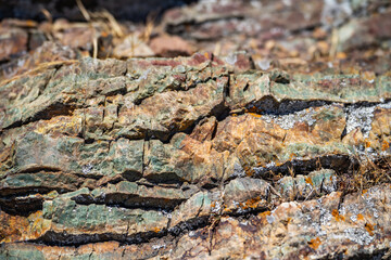 Old stone minerals covered with lichen. Mountain textures of stones. 