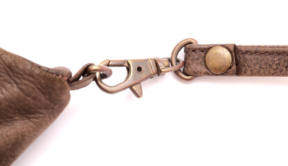 old worn dark brown Nubuck leather bag strap with carabiner lock