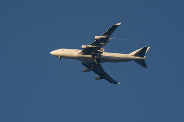 An Airliner Flying in the Sunlight