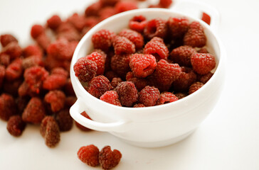 bowl of raspberries. 