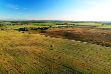 Haystack on field on blue sky background. Hay bale from residues grass. Hay stack for agriculture....
