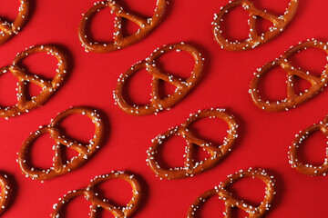 Red background with traditional German bretzel