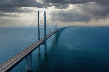 Panoramic aerial view of the Oresundsbron bridge between Denmark and Sweden. Oresund Bridge view at sunset.