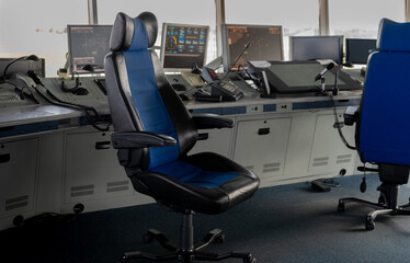 Air traffic controller workplace. Work space of the manager of takeoffs and landings of aircraft at the airport. Monitors, chairs, computers. Air control center office. Unique job.