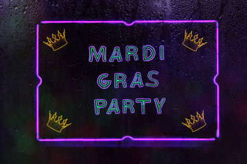 Neon Mardi Gras Party Sign in Rainy Window