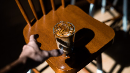 Fototapeta na wymiar glass of coffee with milk on the table