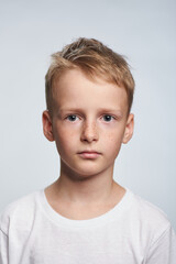Boy blond 10 years old photo for document on white background