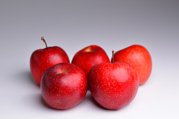 Red natural bio apple, apples harvest, agricultural raw fresh fruit on grey background. Red apples isolated.