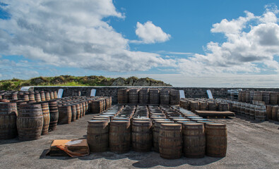 Casks and Barrels in a Whiskey distillery Islay in Scotland coast casks and barrels for Islay Whisky to get aged