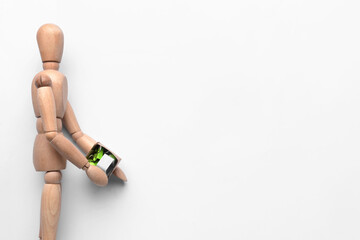 Wooden mannequin with box on white background. Concept of dismissal