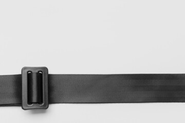 Car seat belt on white background