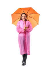 Beautiful young woman with umbrella on white background