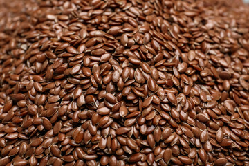 Flax seeds as background, closeup