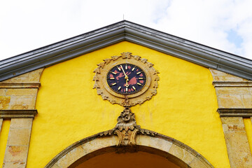 Clock at the entrance of an old castle. Symmetry