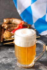 Mug of fresh beer on table. Oktoberfest celebration