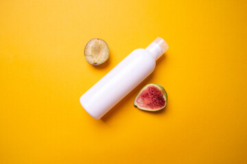 packaging of shampoo or hair rinse on a colored background