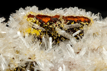 Macro mineral stone crystals Hemimorphite rock on a black background