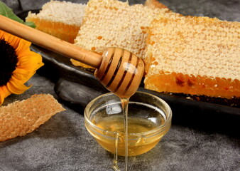 Still life with Honey.Honey in a jar and a honeycomb. Beekeeping concept