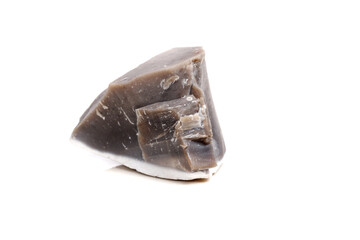 Macro mineral stone Flint in the rock on a white background