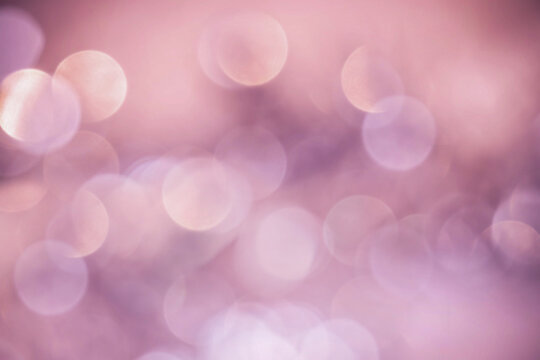 Abstract blurred pattern soft pink bubbles on colored background