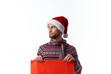 emotional man in a christmas hat with Red mockup poster copy-space studio