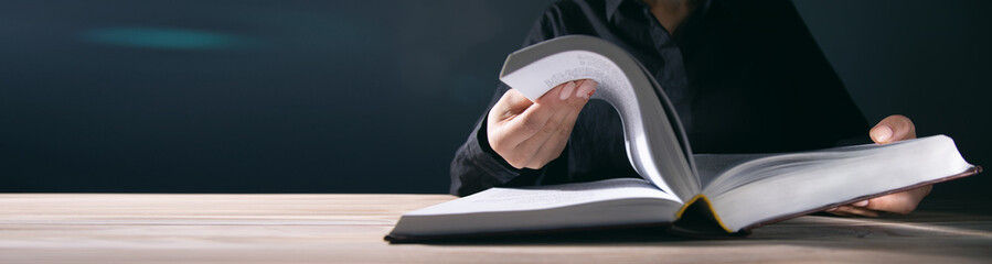 young girl reading a book