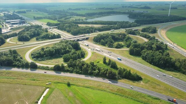Traffic at a highway junction at Hattemerbroek where the N50/A50 and A28 highways cross on the border of Gelderland and Overijssel near Zwolle in The Netherlands.