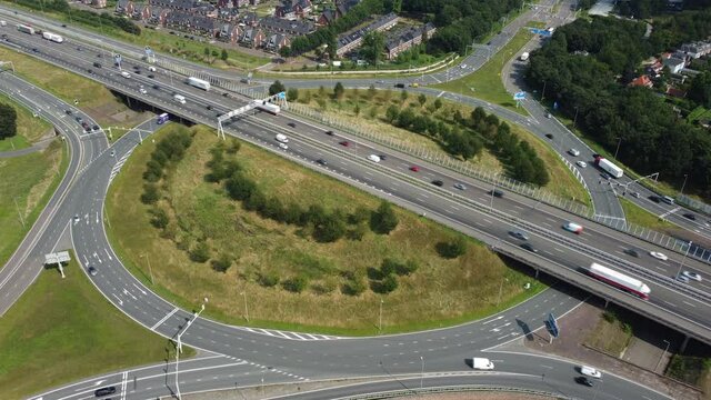 Traffic at a highway junction at Zwolle where the A28 highway runs through the city in Overijssel, The Netherlands.