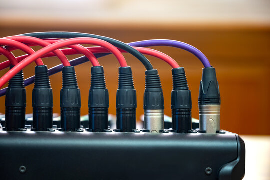 Close up Audio cable with XLR connectors for microphones and professional audio equipment.Connection sockets Analog amplifier.