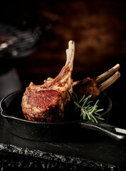 Appetizing barbequed rack of lamb in pan