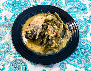 arsik is traditional food in batak ethnic indonesia. made from fish, long beans and some spices.