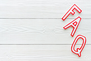 Business concept faq frequently asked questions on office table