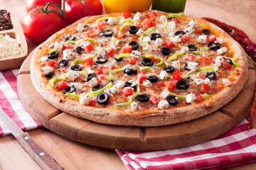 Mediterranean pizza with feta cheese and vegetables.