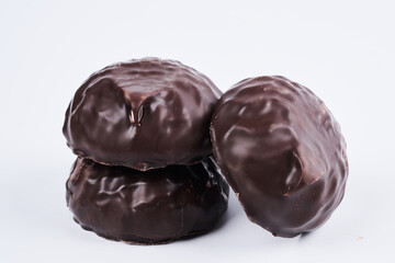 Marshmallow in chocolate glaze close up isolated on white background, clipping path