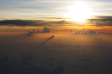 Sun setting behind the clouds over the Gulf Of Mexico