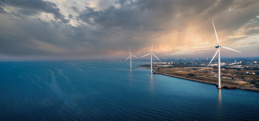 Aerial view of the wind turbines. Green ecological power energy generation. Wind farm eco field....