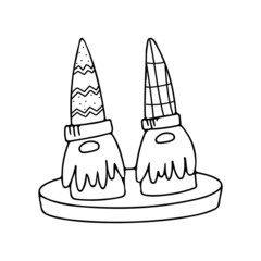Hand drawn pair of Christmas cute gnomes in doodle style hat isolated on white background. Funny vector illustration