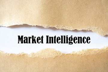 Market Intelligence words written under torn paper.