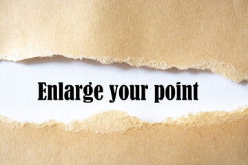 Enlarge your point written under torn paper.