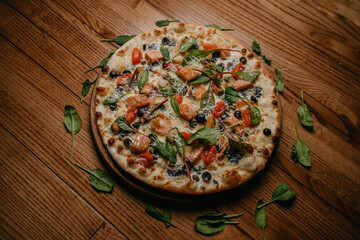 pizza with mussels and salmon