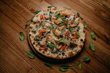 pizza with mussels and salmon
