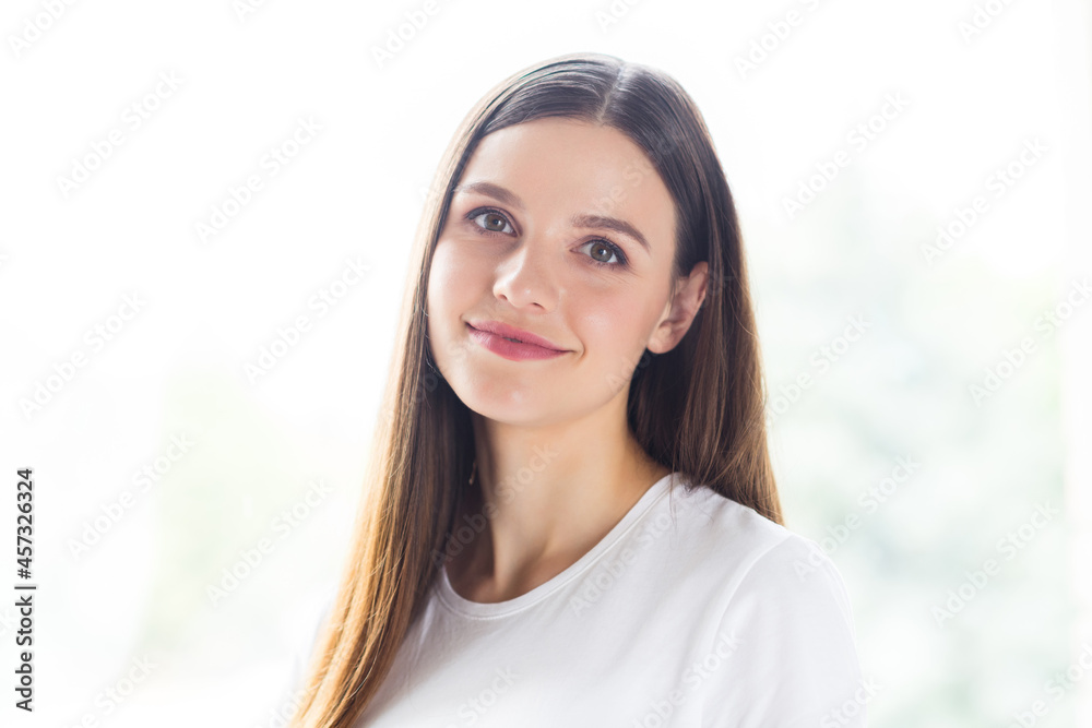 Canvas Prints Portrait of attractive calm cheerful girl spending free spare time at light white home indoors