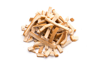 Bread crumbs or dried breadcrumbs on a white background