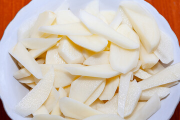 Chopped raw potatoes