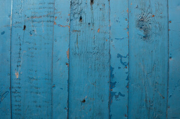 Fototapeta na wymiar wooden slats painted with blue paint