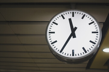 A clock in the underground subway station with copy space