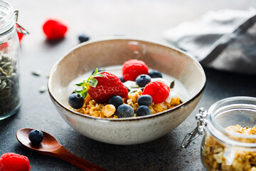 Healthy breakfast, cereal with berries and yogurt