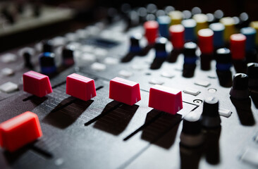 Fototapeta premium Volume regulators on dj mixer. Audio mixing controller faders for professional disc jockey